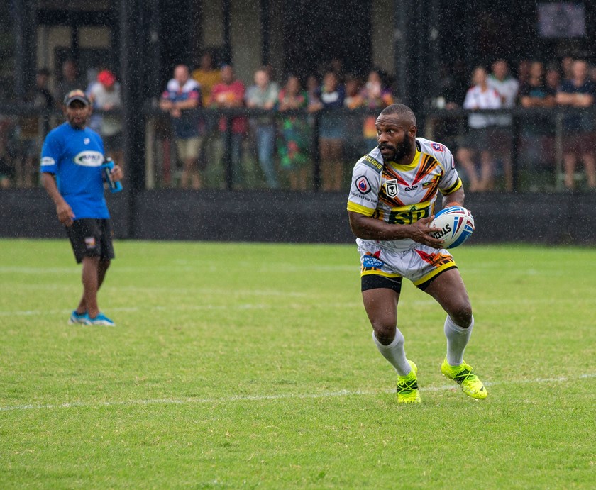 Charlie Simon with the ball for PNG Hunters. Photo: Jim O'Reilly / QRL
