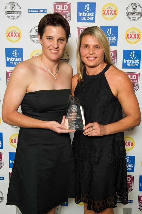 Heather Ballinger is presented with her Queensland Representative Player of the Year award in 2015 by Karyn Murphy. Photo: Marc Grimwade Photography