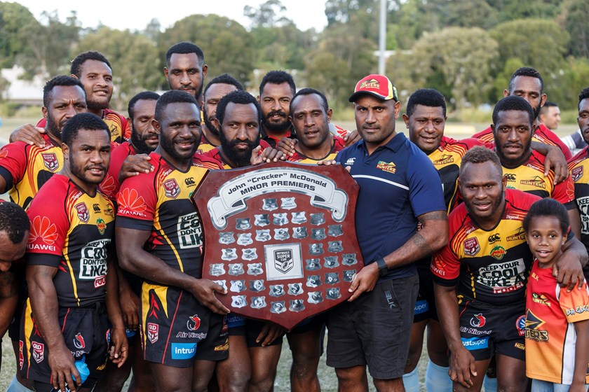 Michael Marum and members of the PNG Hunters team with the 2017 minor premiers shield.