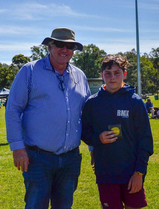 Scott Wybird presented the Norm Bradtke Medal to Under 13s Player of the Carnival Bill Woodward from Mount Isa