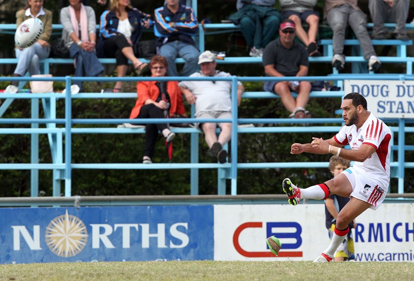 Liam Georgetown kicks a goal for Redcliffe. Photo: QRL Media