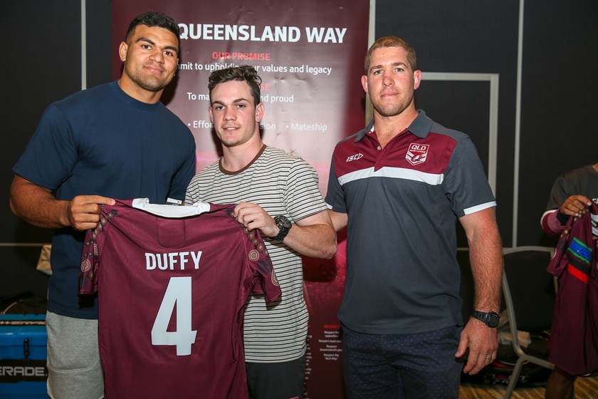 David Fifita joined with Keiron Lander to present Queensland Under 16 Murri player Brayden Duffy with his jersey in 2019. Photo: QRL
