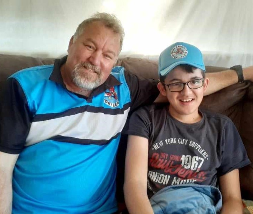 President Ken Brown with Jaxon Ryan. The Club raised funds for Jax's medical and travel expenses after he was struck by a car in Miles and airlifted to Brisbane.