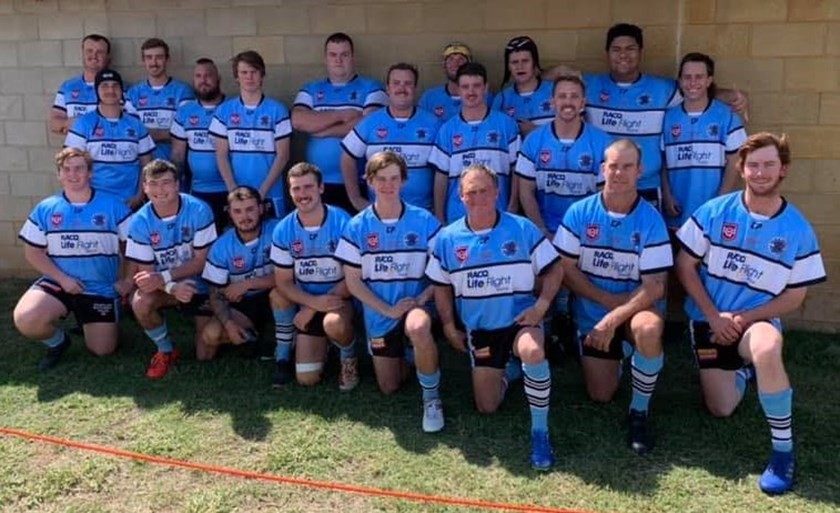 Miles Devils players wearing the LifeFlight Miles Jerseys that were auctioned off at the end of the game.