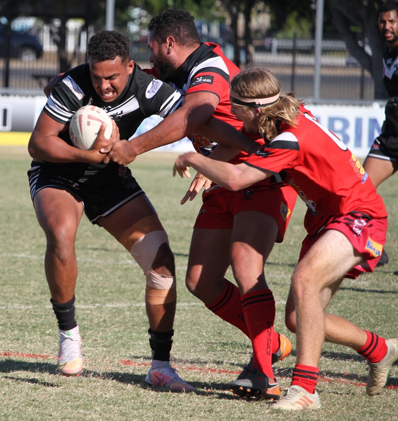 Easts Magpies halfback Tyrell Howard attempts to break out of the tackle of Wests Panthers’ Nick Tanner and Brendan Grills in their Bundaberg Broadcasters A Grade Premiership clash on Sunday. Photo: Vince Habermann