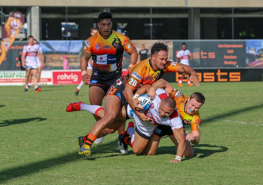 Jamil Hopoate meets Easts Tigers defence. Photo: QRL Media