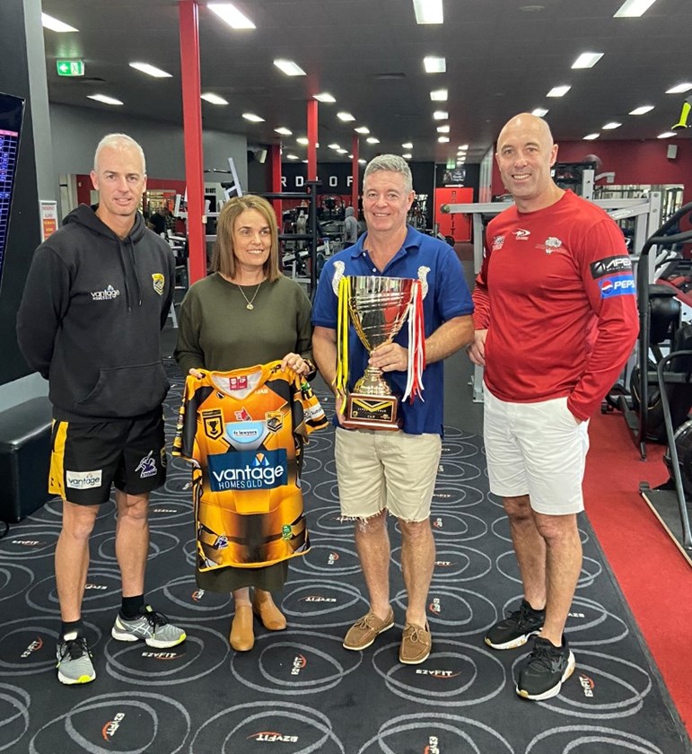 Falcons coach Sam Mawhinney with Redcliffe Dolphins coach Adam Mogg with Sonya and Michael Ackerman.  Photo: Sunshine Coast Falcons