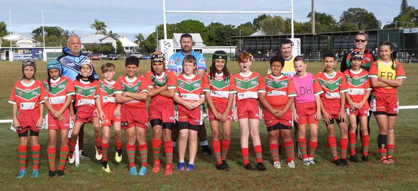 The under 12s Red team, with coach Brody Parsons. 
