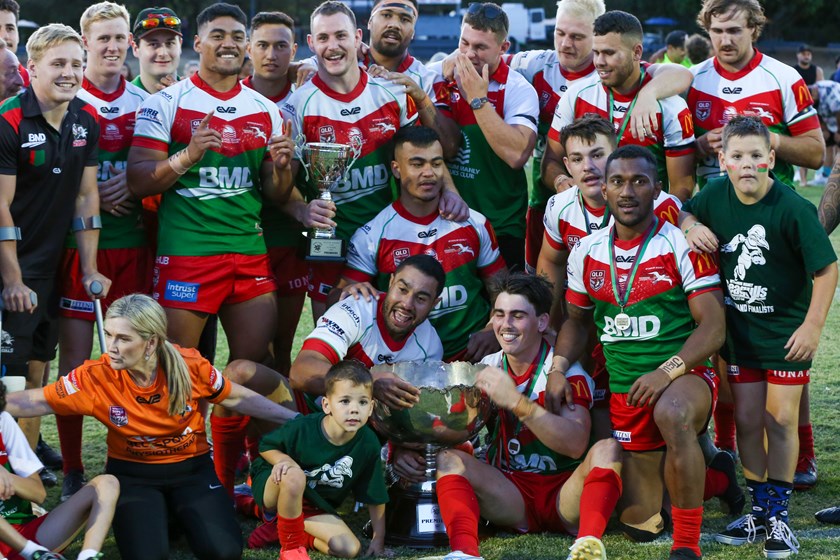 An injured Max Plath (far left) celebrates Wynnum Manly winning the 2020 Brisbane Rugby League title. Photo: Jorja Brinums / QRL
