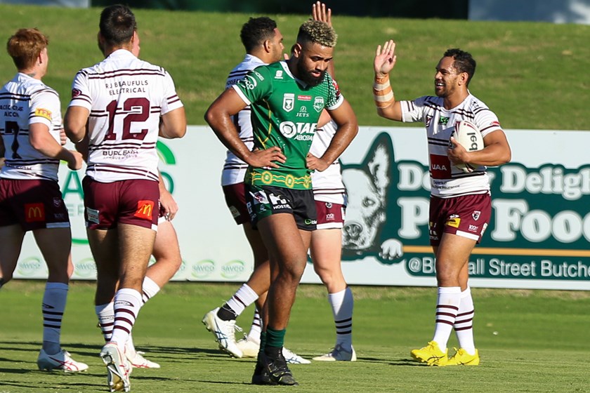 Pat Politoni high-fives after scoring a try. Photo: Jacob Grams/QRL