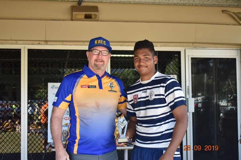 Player of the Final Jamal Shibasaki from Townsville Brothers Blue with Brad Tassell.