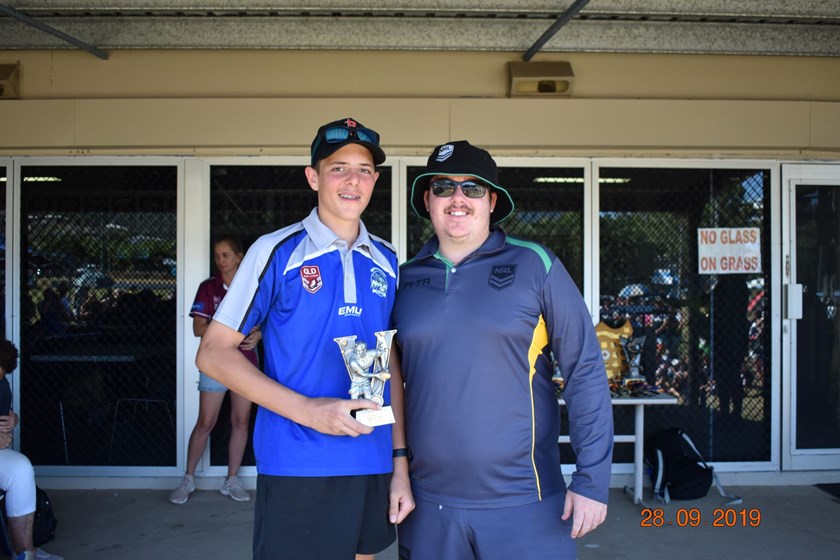 Referee of the Carnival Alex Reid from Mackay with Jaymi Evans.