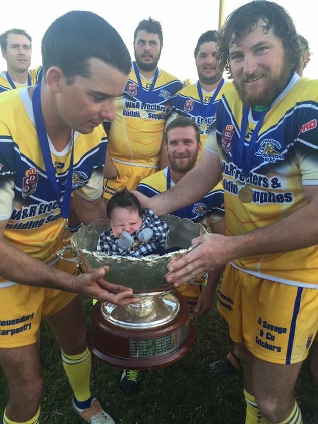 Trent Hoad with his daughter Kora, who was just 10 days old when he won his first premiership.