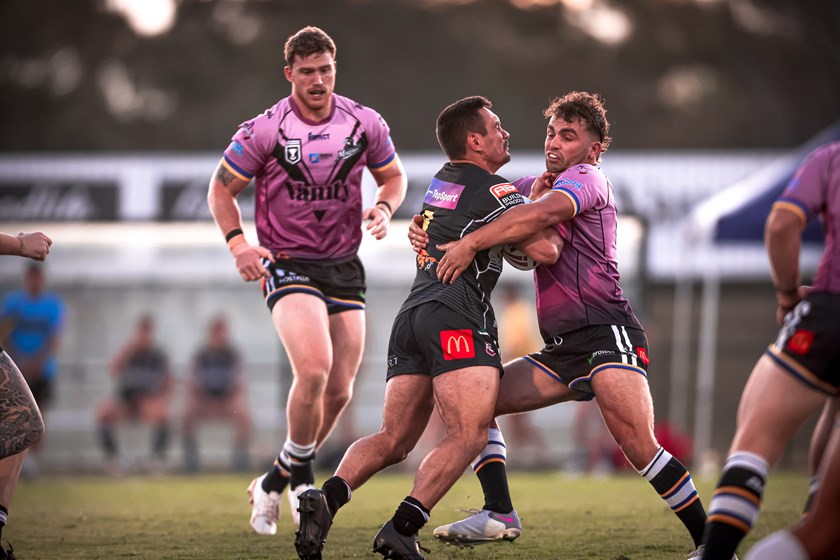 Rory Ferguson tackling. Photo: Erick Lucero/QRL