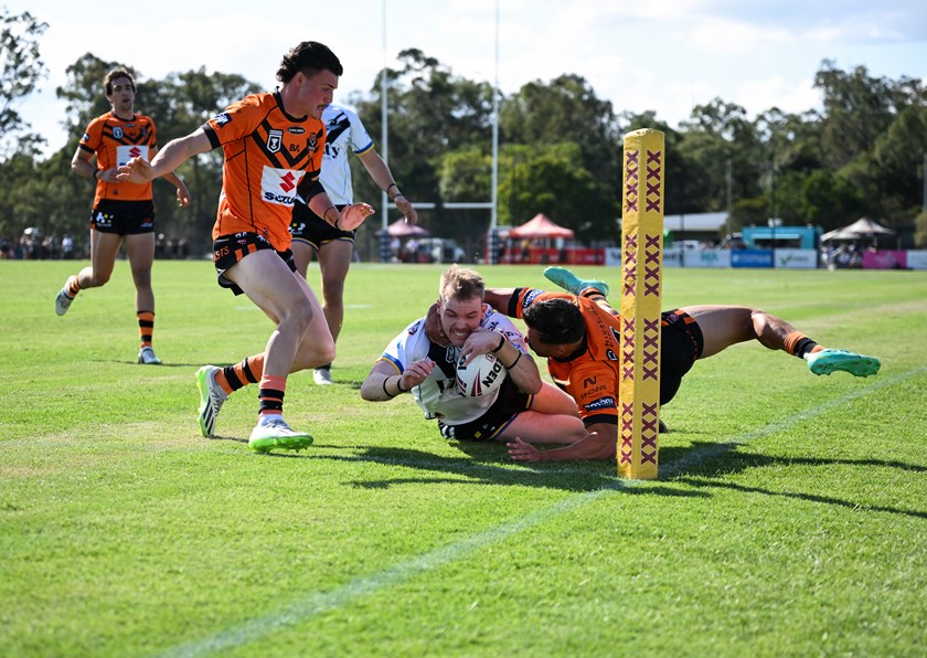 Jack Smith scoring his first try of his double for the game. Photo: Zain Mohammed/QRL
