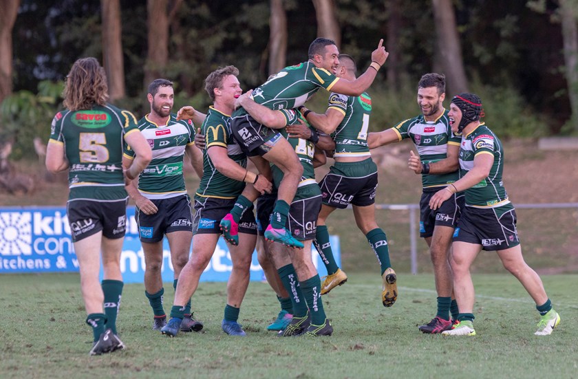 Lenehan celebrates with the Jets during his debut season. Photo: QRL