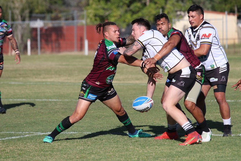 Shaun Nona attempts to wrap up Jacob Tonge. Photo: Colleen Edwards / QRL