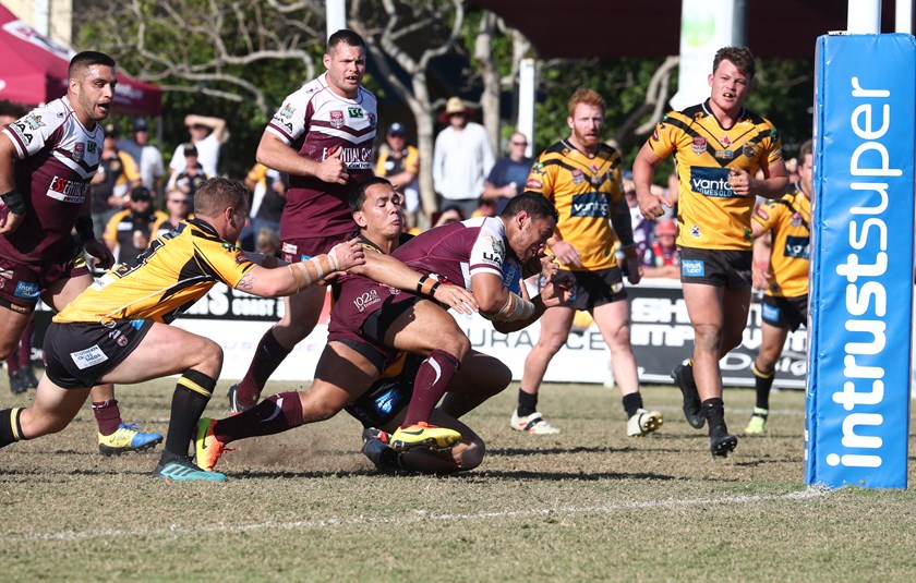 Pat Politoni on his way to scoring a try in Burleigh's win over the Sunshine Coast. Photo: Jason O'Brien QRL Media
