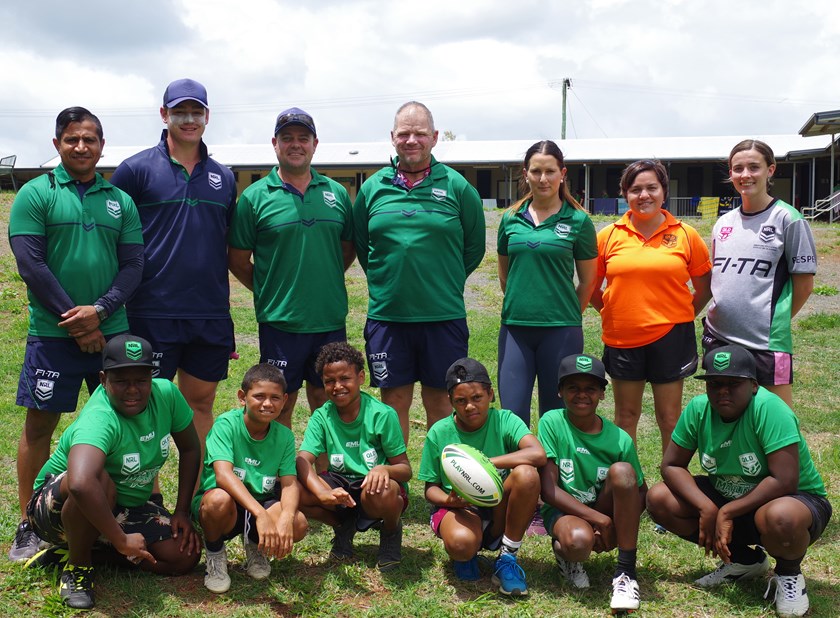 NRL Game Development staff Atul Chowdhary, William Kennedy, Adam MacDonald, Alby Anderson, Renae Bonner, Tanya Tully (QRL Club Support) and NRL trainee Maddi Stammers with the six youngsters from Mabuiag Island. Photo: Maria Girgenti