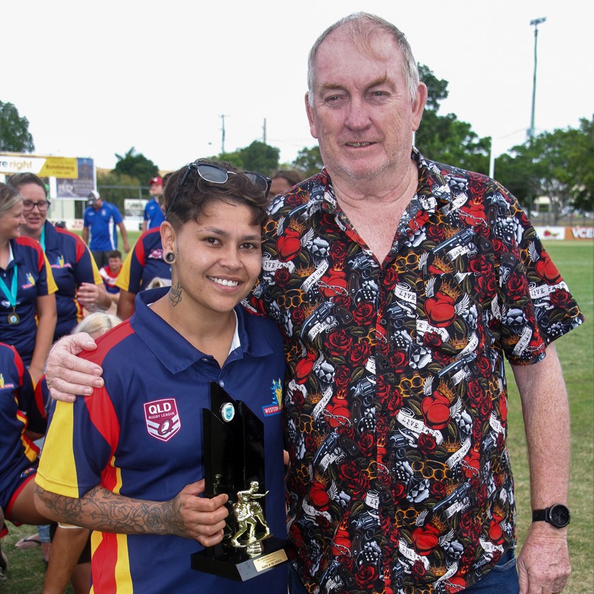 47th Battalion Women’s player of the carnival Courtney Robinson with QRL Central chair Danny McGuire. Photo: Vince Habermann