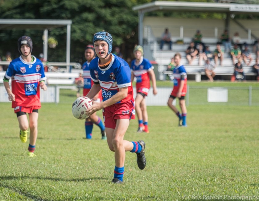 An Ivanhoes junior rugby league player in action. Photo: Chris Robson
