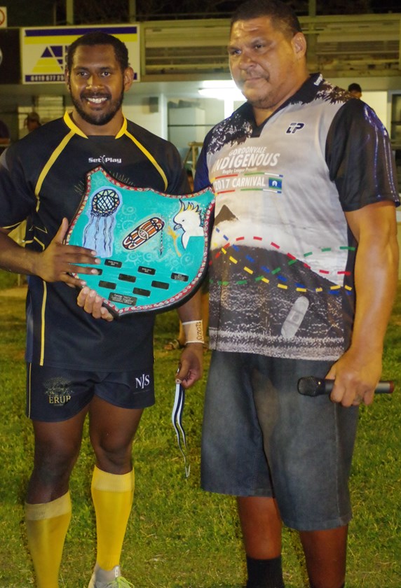 Erub United captain Bradley Stephen was presented with the George 'McFly' Ludwick-Singleton Memorial Shield by Jason Joinbee. Photo: Maria Girgenti