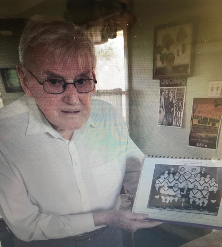 Stu Pankoff at his Eastern Heights (Ipswich) home in 2017 with a photo of the Tivoli Tigers. Photo: supplied