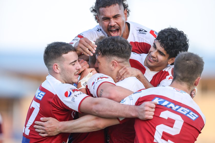 With teammates. Photo: Dylan Parker/QRL