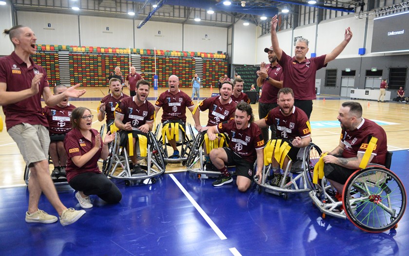 Jack Brown, far left, celebrating with the Queensland team after they claimed the 2022 Wheelchair State of Origin title. Photo: Scott Radford-Chisholm/QRL