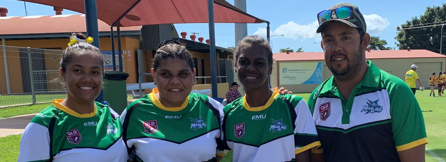 Main Image: Sorren Owens from Mornington Island with the Mornington Island girls and Jordan Marshall from Burketown who played in the Northern Outback women's team
