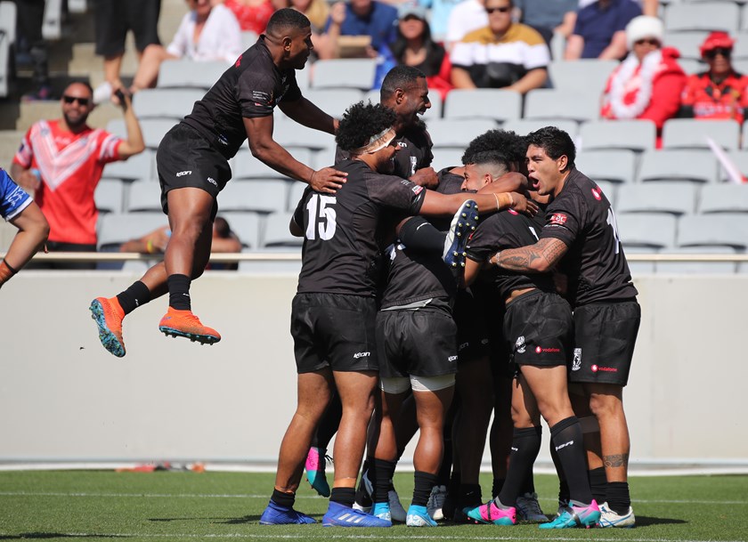 Lamar Liolavave (far right) celebrates with his Fiji Bati team mates. Photo: NRL Photos