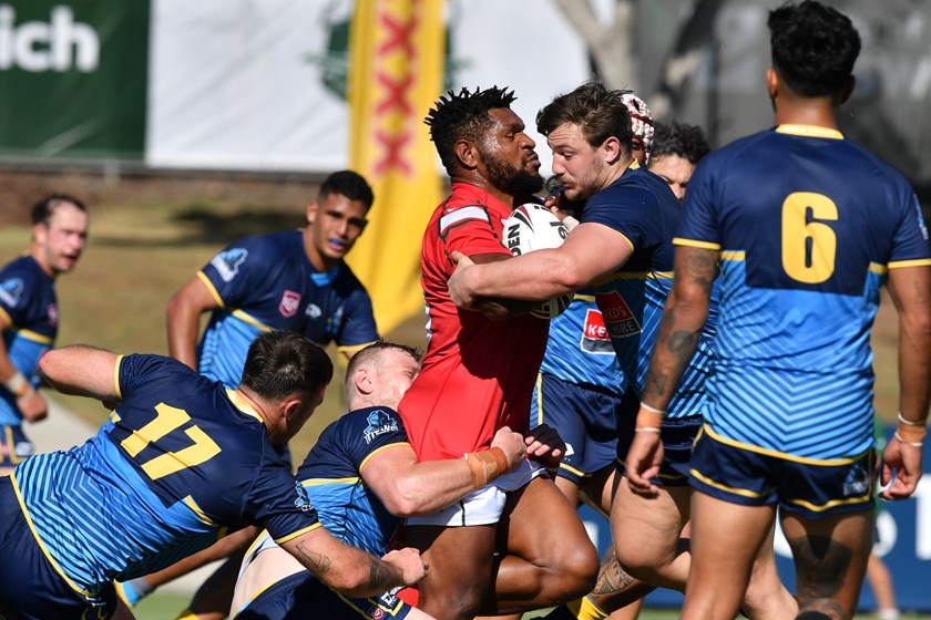 Dilbert Issac hits it up into the Gold Coast defensive line playing for Brisbane Red in the 2023 XXXX Chairman's Challenge. Photo: Vanessa Hafner/QRL