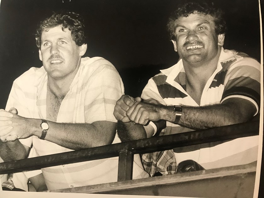 Former Maroons and Wynnum Manly teammates Gene Miles and Colin Scott watch a Wynnum game at Kougari Oval in 1985 during their Queensland pomp.  Photo: NRL Images