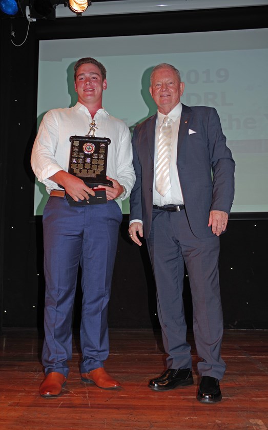 Will Kennedy won the Referee of the Year and was awarded the Curtis Pitt MP Trophy by Warren Pitt. Photo: Maria Girgenti