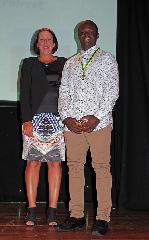 Saifu Savage from Cairns Brothers won the Cairns District Rugby League Under 16 Best & Fairest Silver Medal which was presented to him by Jodi Stevens - Cairns District Junior Rugby League Chairman. Photo: Maria Girgenti