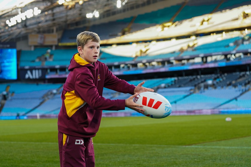 Charlie passing the Origin ball.
