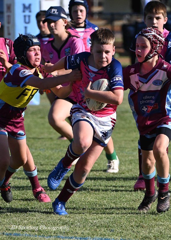 Roma Saints player pushes through Goondiwindi Boars defence. Image: JD Sporting Photography