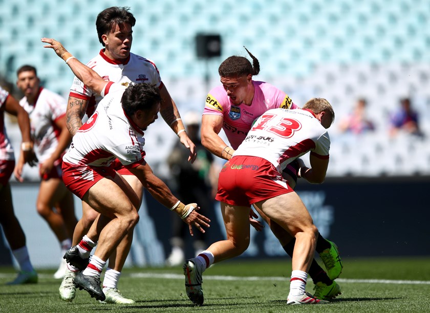 Sam Elliott, Duncan Hall medal winner, crunches the Panthers. NRL Imagery.