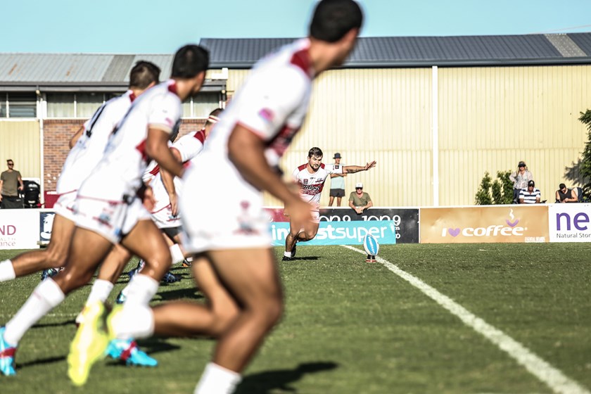 Cameron Cullen kicks off for Redcliffe in the Round 2 game against Burleigh Bears. Photo: QRL Media