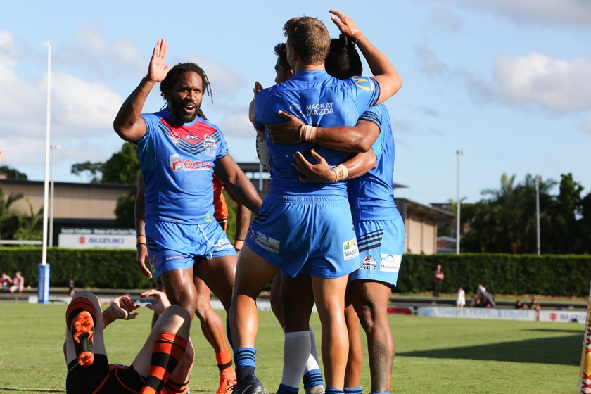 Jardine Bobongie celebrates with his Cutters team-mates in Round 2.