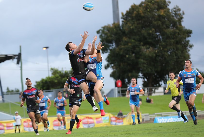 Lachlan Coote goes up for a high ball for the Mackay Cutters. Photo: Gordon Greaves 